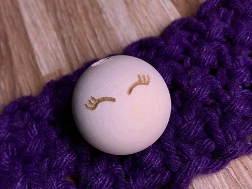 Koral grawerowany 25mm Oczy